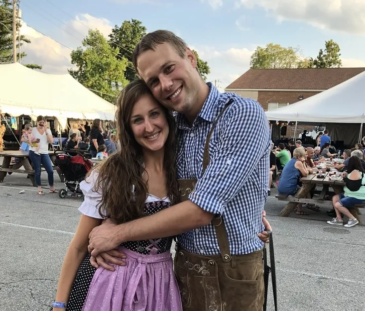 A couple in dirndl and lederhosen at Holy Name Oktoberfest