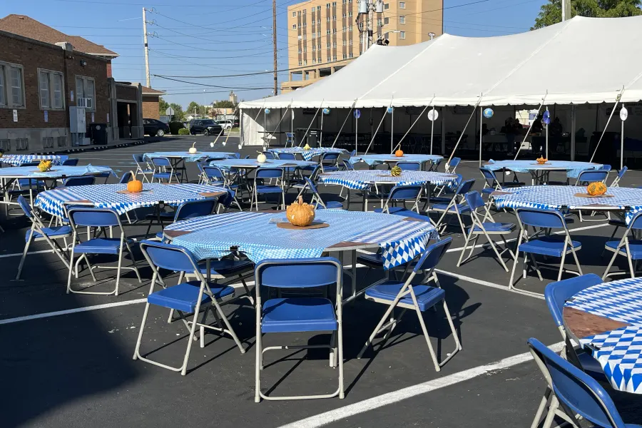 Rows of tables under the big tents set up and ready before the festival opens